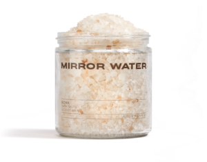 mirror water bath salts in glass open jar